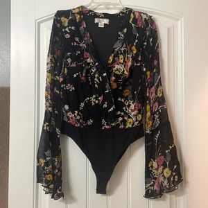 Band of gypsies body suit.